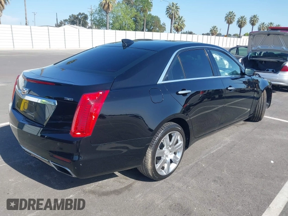 2016 Cadillac CTS Luxury Collection RWD z VIN 1G6AR5SS8G0156144, wystawiony jako IAAI lot #42087602 z przebiegiem Nie podano mil oraz . Historia ofert i sprzedaży dostępna na DreamBid. Obrazek 4.