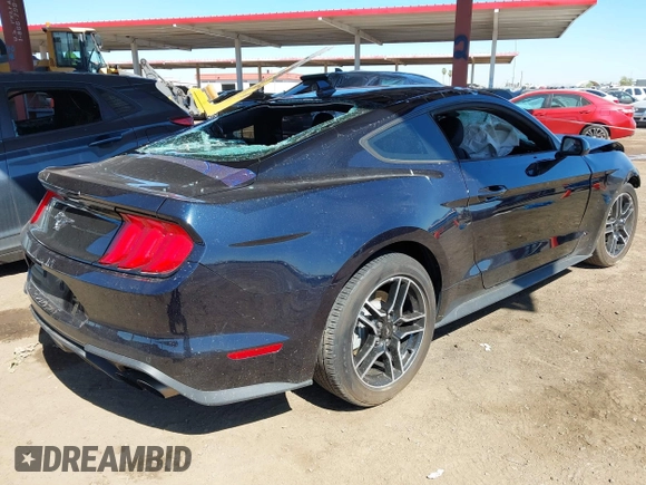 2021 Ford Mustang EcoBoost with VIN 1FA6P8TH2M5104154, listed as a IAAI auction lot 41869810 with 15,561 mi miles and . Bid and sale history available at DreamBid. Image 4.
