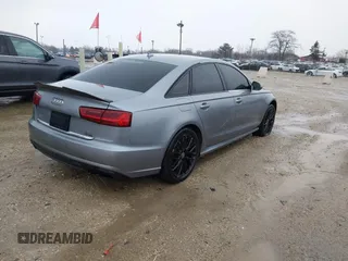 2016 Audi A6 2.0T Premium Plus with VIN WAUGFAFC1GN014536, listed as a IAAI auction lot 41937616 with 122,417 mi miles. Bid and sale history available at carsss.com. Image 4.