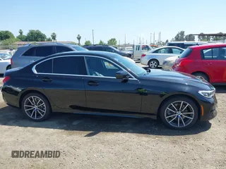 2019 BMW 3 Series 330i with VIN WBA5R1C50KAJ98579, listed as a IAAI auction lot 42359728 with 41,173 mi miles and . Bid and sale history available at DreamBid. Image 13.