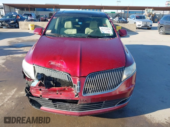 2014 Lincoln MKT EcoBoost z VIN 2LMHJ5AT1EBL50796, wystawiony jako IAAI lot #41371551 z przebiegiem 163 932 mil mil oraz . Historia ofert i sprzedaży dostępna na DreamBid. Obrazek 12.