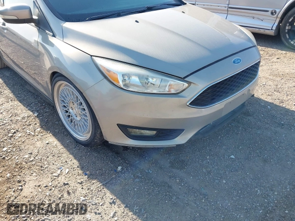 2015 Ford Focus SE with VIN 1FADP3K23FL261021, listed as a IAAI auction lot 42014802 with 157,283 mi miles. Bid and sale history available at carsss.com. Image 6.