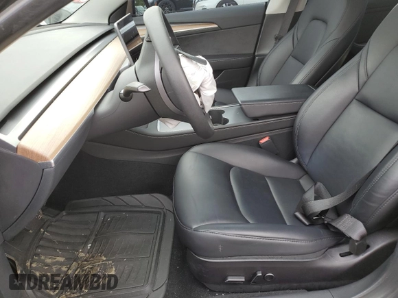 2023 Tesla Model 3 with VIN 5YJ3E1EA3PF451764, listed as a Copart auction lot 58718705 with 33,965 mi miles and Salvage title. Bid and sale history available at DreamBid. Image 7.