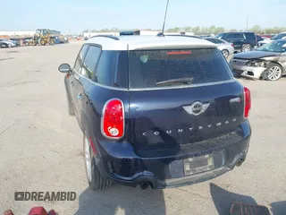 2013 MINI Countryman S ALL4 with VIN WMWZC5C58DWP33707, listed as a IAAI auction lot 41835234 with 98,441 mi miles and . Bid and sale history available at DreamBid. Image 3.