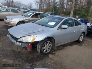 2003 Honda Accord Cpe EX with VIN 1HGCM82653A007091, listed as a IAAI auction lot 40997964 with 213,818 mi miles. Bid and sale history available at carsss.com. Image 2.