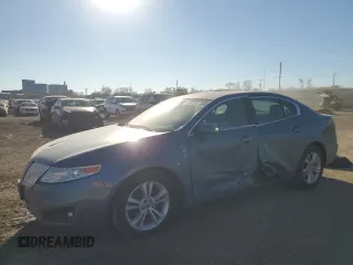 2010 Lincoln MKS with VIN 1LNHL9DR7AG615897, listed as a Copart auction lot 87606245 with 215,353 mi miles and Salvage Title. Bid and sale history available at DreamBid. Image 1.