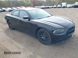 2012 Dodge Charger SE with VIN 2C3CDXBG1CH218814, listed as a IAAI auction lot 42125550 with 113,784 mi miles. Bid and sale history available at carsss.com. Image 1.