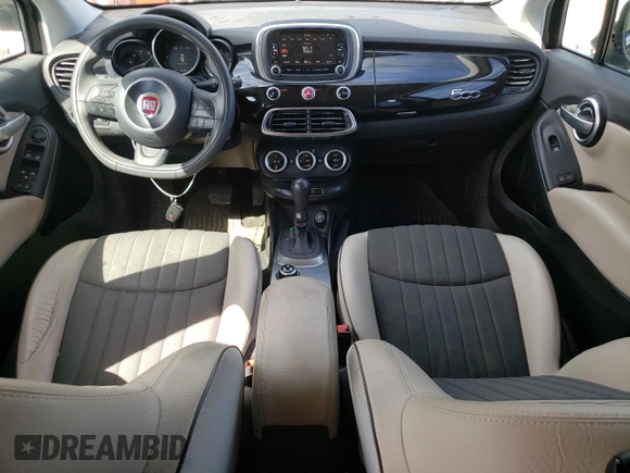 2016 FIAT 500X Lounge z VIN ZFBCFYDT4GP395562, wystawiony jako Copart lot #52273235 z przebiegiem 150 036 mil mil oraz Szkody całkowita. Historia ofert i sprzedaży dostępna na DreamBid. Obrazek 8.
