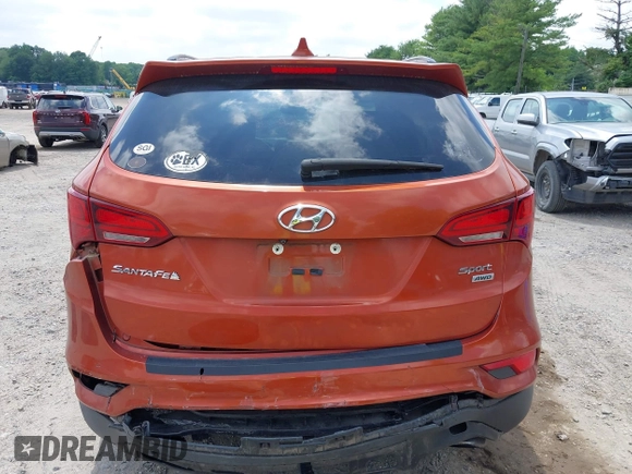 2017 Hyundai Santa Fe 2.4L z VIN 5XYZUDLB1HG463416, wystawiony jako IAAI lot #42546637 z przebiegiem 81 963 mil mil oraz . Historia ofert i sprzedaży dostępna na DreamBid. Obrazek 16.