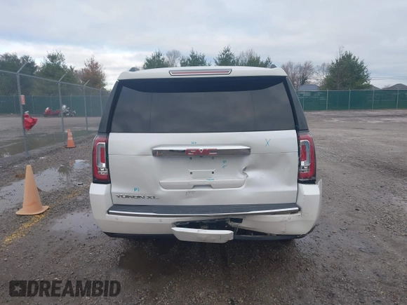 2016 GMC Yukon XL Denali with VIN 1GKS2HKJ9GR264481, listed as a IAAI auction lot 41764272 with 114,852 mi miles. Bid and sale history available at carsss.com. Image 16.