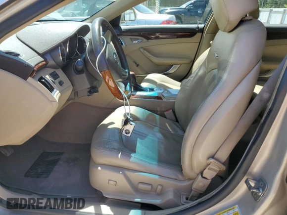 2009 Cadillac CTS RWD with VIN 1G6DF577090143935, listed as a Copart auction lot 54719885 with 158,801 mi miles and Salvage Title. Bid and sale history available at DreamBid. Image 7.