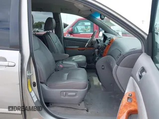 2009 Toyota Sienna XLE with VIN 5TDBK22C89S022909, listed as a IAAI auction lot 42139786 with 107,247 mi miles and . Bid and sale history available at DreamBid. Image 5.