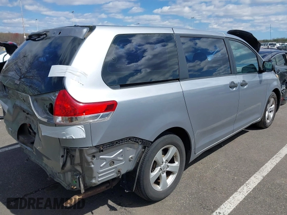 2013 Toyota Sienna L with VIN 5TDZK3DC9DS298333, listed as a IAAI auction lot 41941011 with 141,021 mi miles. Bid and sale history available at carsss.com. Image 4.