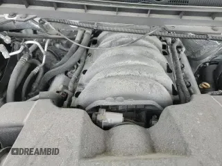 2018 Chevrolet Silverado 1500 LT z VIN 3GCPCREC2JG367282, wystawiony jako Copart lot #70657225 z przebiegiem 27 427 mil mil oraz Szkoda całkowita • Salvage title. Historia ofert i sprzedaży dostępna na DreamBid. Obrazek 16.