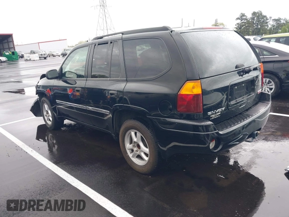 2007 GMC Envoy SLE with VIN 1GKDS13S872309605, listed as a IAAI auction lot 41946509 with 184,638 mi miles. Bid and sale history available at carsss.com. Image 3.