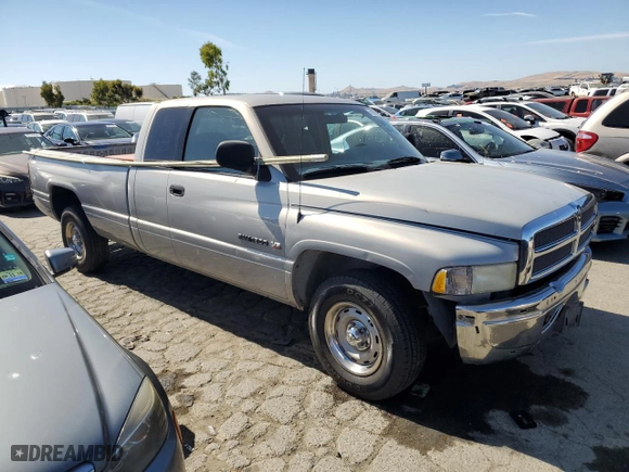 2000 Dodge Ram 1500 with VIN 3B7HC13Y4YG120005, listed as a Copart auction lot 57108154 with 124,940 mi miles and Salvage Title. Bid and sale history available at carsss.com. Image 4.