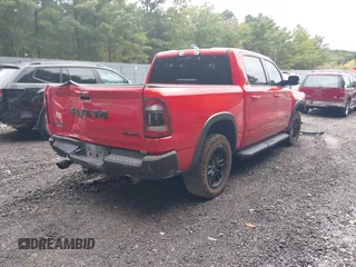 2021 Ram 1500 Rebel with VIN 1C6SRFLT2MN591844, listed as a IAAI auction lot 40410248 with 84,759 mi miles and . Bid and sale history available at DreamBid. Image 4.