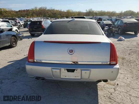 2010 Cadillac DTS w/1SC with VIN 1G6KD5EYXAU126775, listed as a Copart auction lot 77207094 with 100,288 mi miles and Salvage Title. Bid and sale history available at carsss.com. Image 6.