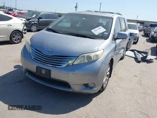 2012 Toyota Sienna XLE AAS with VIN 5TDYK3DC7CS185555, listed as a IAAI auction lot 42013098 with 140,969 mi miles. Bid and sale history available at carsss.com. Image 18.