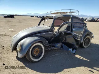 1967 Volkswagen Beetle with VIN 117141737, listed as a Copart auction lot 77373074 with 22,424 mi miles and Salvage Title. Bid and sale history available at DreamBid. Image 1.