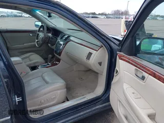 2006 Cadillac DTS w/1SC with VIN 1G6KD57Y26U103494, listed as a IAAI auction lot 42072696 with 85,675 mi miles. Bid and sale history available at carsss.com. Image 5.