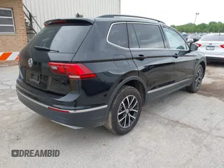 2021 Volkswagen Tiguan SE z VIN 3VV3B7AXXMM101773, wystawiony jako IAAI lot #42358588 z przebiegiem 105 629 mil mil oraz . Historia ofert i sprzedaży dostępna na DreamBid. Obrazek 4.