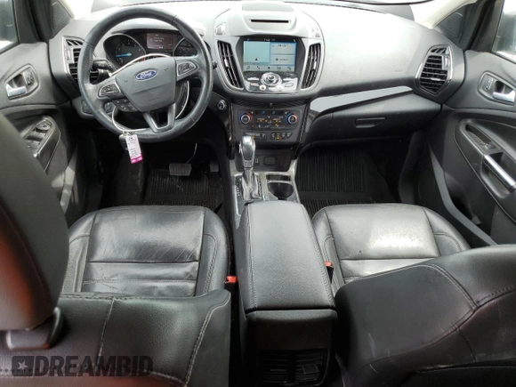 2018 Ford Escape Titanium with VIN 1FMCU9J97JUB34691, listed as a Copart auction lot 56404625 with 107,037 mi miles and Salvage title. Bid and sale history available at DreamBid. Image 8.