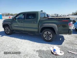 2022 Toyota Tacoma SR z VIN 3TMCZ5AN6NM479653, wystawiony jako Copart lot #47704285 z przebiegiem 57 618 mil mil oraz Szkoda całkowita • Salvage title. Historia ofert i sprzedaży dostępna na DreamBid. Obrazek 2.