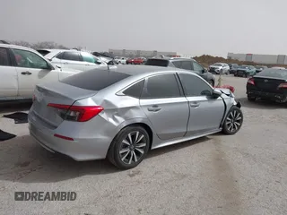 2023 Honda Civic EX with VIN 2HGFE1F77PH321210, listed as a IAAI auction lot 41797011 with 8,748 mi miles and . Bid and sale history available at DreamBid. Image 4.