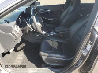2015 Mercedes-Benz CLA 250 with VIN WDDSJ4EB7FN180683, listed as a Copart auction lot 54276095 with 58,728 mi miles and Salvage Title. Bid and sale history available at DreamBid. Image 7.