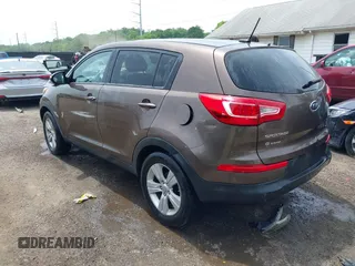 2012 Kia Sportage LX z VIN KNDPB3A20C7290990, wystawiony jako IAAI lot #42264420 z przebiegiem 87 994 mil mil oraz . Historia ofert i sprzedaży dostępna na DreamBid. Obrazek 3.