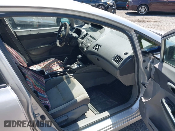 2009 Honda Civic DX-VP z VIN 2HGFA16399H349229, wystawiony jako IAAI lot #41749953 z przebiegiem 201 533 mil mil oraz . Historia ofert i sprzedaży dostępna na DreamBid. Obrazek 5.