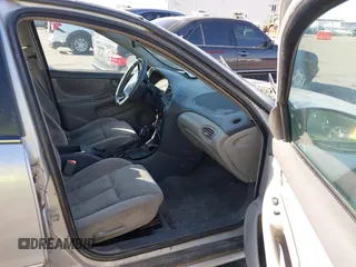 2004 Oldsmobile Alero GL1 z VIN 1G3NL52E54C196878, wystawiony jako IAAI lot #42357662 z przebiegiem Nie podano mil oraz . Historia ofert i sprzedaży dostępna na DreamBid. Obrazek 5.
