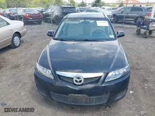 2006 Mazda Mazda6 Grand Touring s with VIN 1YVHP80DX65M52771, listed as a IAAI auction lot 42091020 with 207,727 mi miles. Bid and sale history available at carsss.com. Image 6.