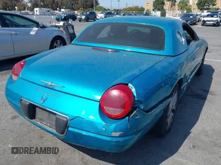 2004 Ford Thunderbird Deluxe with VIN 1FAHP60A14Y106321, listed as a IAAI auction lot 42086505 with 1 mi miles. Bid and sale history available at carsss.com. Image 4.