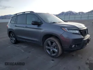2021 Honda Passport Touring with VIN 5FNYF8H93MB006966, listed as a Copart auction lot 84738884 with 48,467 mi miles and Salvage Title. Bid and sale history available at carsss.com. Image 4.