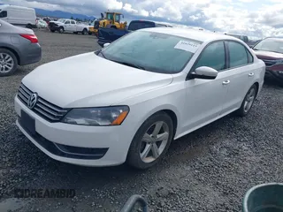 2013 Volkswagen Passat Wolfsburg Edition with VIN 1VWAP7A39DC132046, listed as a IAAI auction lot 41829115 with 122,660 mi miles. Bid and sale history available at carsss.com. Image 2.