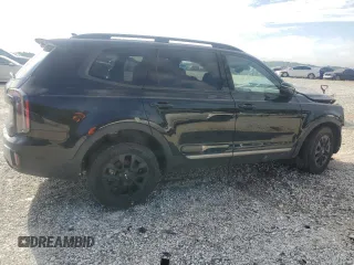 2023 Kia Telluride SX Prestige с VIN 5XYP5DGC9PG410954, выставлен на аукционе Copart как лот 63052425 с пробегом Не указан миль и Списание • Salvage title. История ставок и продаж доступна на DreamBid. Изображение 3.