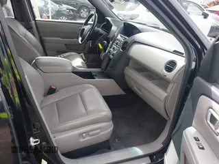 2013 Honda Pilot EX-L with VIN 5FNYF4H56DB007700, listed as a IAAI auction lot 41696288 with 167,658 mi miles. Bid and sale history available at carsss.com. Image 5.