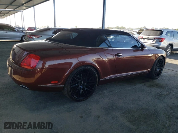 2007 Bentley Continental GT with VIN SCBDR33W77C047935, listed as a Copart auction lot 60557985 with 61,661 mi miles and Salvage title. Bid and sale history available at DreamBid. Image 3.
