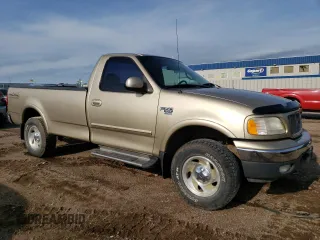2000 Ford F-150 XL with VIN 1FTRF18L9YKA95457, listed as a Copart auction lot 67083164 with 97,988 mi miles and Salvage title. Bid and sale history available at DreamBid. Image 4.