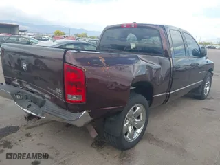 2005 Dodge Ram 1500 SLT with VIN 1D7HA18D05S215506, listed as a IAAI auction lot 41957222 with 143,992 mi miles. Bid and sale history available at carsss.com. Image 4.