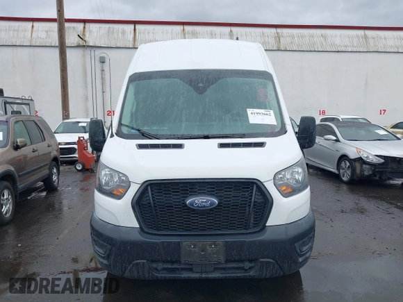 2023 Ford Transit Cargo with VIN 1FTBR3U89PKA09391, listed as a IAAI auction lot 41993662 with 36,147 mi miles and . Bid and sale history available at DreamBid. Image 12.