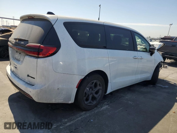 2023 Chrysler Pacifica Hybrid Limited z VIN 2C4RC1S72PR589177, wystawiony jako Copart lot #64046525 z przebiegiem 12 658 mil mil oraz Szkoda całkowita • Salvage title. Historia ofert i sprzedaży dostępna na DreamBid. Obrazek 3.