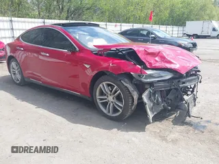 2014 Tesla Model S 60 z VIN 5YJSA1H14EFP63897, wystawiony jako IAAI lot #42174520 z przebiegiem 64 429 mil mil oraz . Historia ofert i sprzedaży dostępna na DreamBid. Obrazek 1.