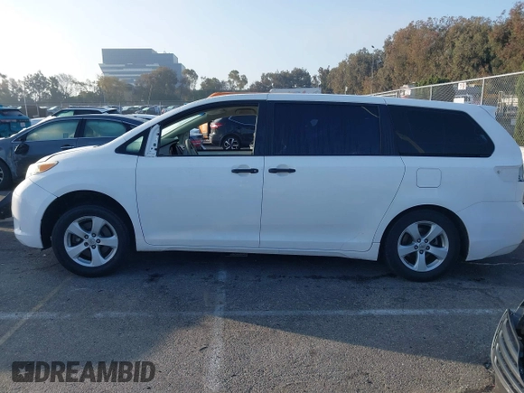 2011 Toyota Sienna with VIN 5TDZK3DC6BS079634, listed as a IAAI auction lot 41506833 with 112,051 mi miles. Bid and sale history available at carsss.com. Image 14.