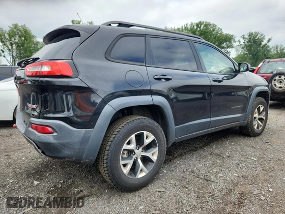 2014 Jeep Cherokee Trailhawk with VIN 1C4PJMBS3EW127928, listed as a Copart auction lot 63825865 with 172,712 mi miles and Salvage title. Bid and sale history available at DreamBid. Image 3.