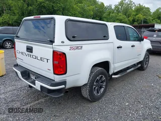 2021 Chevrolet Colorado 4WD Z71 with VIN 1GCGTDEN3M1122062, listed as a IAAI auction lot 42687632 with 52,233 mi miles and . Bid and sale history available at DreamBid. Image 4.