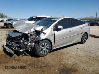 2020 Toyota Prius LE z VIN JTDKARFPXL3124035, wystawiony jako Copart lot #53996215 z przebiegiem Nie podano mil oraz Szkoda całkowita • Salvage title. Historia ofert i sprzedaży dostępna na DreamBid. Obrazek 1.
