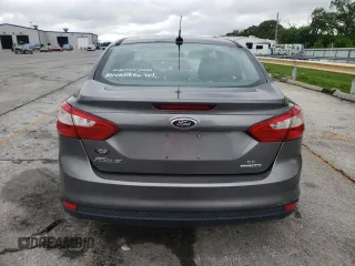 2013 Ford Focus SE with VIN 1FADP3F29DL207679, listed as a Copart auction lot 58322625 with 142,610 mi miles and Salvage title. Bid and sale history available at DreamBid. Image 6.
